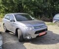 Серый Мицубиси Аутлендер, объемом двигателя 2 л и пробегом 153 тыс. км за 12300 $, фото 1 на Automoto.ua