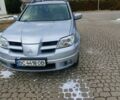 Серый Мицубиси Аутлендер, объемом двигателя 2.4 л и пробегом 238 тыс. км за 8200 $, фото 3 на Automoto.ua