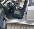 Серый Мицубиси Аутлендер, объемом двигателя 2.4 л и пробегом 238 тыс. км за 8200 $, фото 1 на Automoto.ua