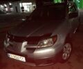Сірий Міцубісі Аутлендер, об'ємом двигуна 2 л та пробігом 307 тис. км за 6800 $, фото 1 на Automoto.ua
