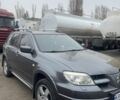 Сірий Міцубісі Аутлендер, об'ємом двигуна 2.4 л та пробігом 190 тис. км за 6500 $, фото 1 на Automoto.ua