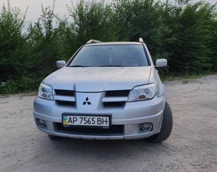 Сірий Міцубісі Аутлендер, об'ємом двигуна 2.4 л та пробігом 204 тис. км за 5600 $, фото 3 на Automoto.ua