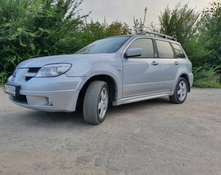 Сірий Міцубісі Аутлендер, об'ємом двигуна 2.4 л та пробігом 204 тис. км за 5600 $, фото 2 на Automoto.ua