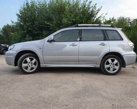 Сірий Міцубісі Аутлендер, об'ємом двигуна 2.4 л та пробігом 204 тис. км за 5600 $, фото 1 на Automoto.ua