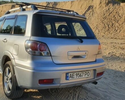 Серый Мицубиси Аутлендер, объемом двигателя 2 л и пробегом 138 тыс. км за 7600 $, фото 8 на Automoto.ua