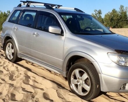 Серый Мицубиси Аутлендер, объемом двигателя 2 л и пробегом 138 тыс. км за 7600 $, фото 2 на Automoto.ua