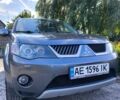 Сірий Міцубісі Аутлендер, об'ємом двигуна 2.4 л та пробігом 160 тис. км за 8978 $, фото 1 на Automoto.ua