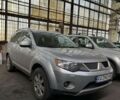 Серый Мицубиси Аутлендер, объемом двигателя 2 л и пробегом 250 тыс. км за 4700 $, фото 1 на Automoto.ua