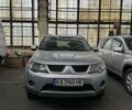 Сірий Міцубісі Аутлендер, об'ємом двигуна 2 л та пробігом 250 тис. км за 5500 $, фото 1 на Automoto.ua