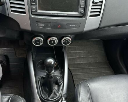 Серый Мицубиси Аутлендер, объемом двигателя 2 л и пробегом 250 тыс. км за 4700 $, фото 7 на Automoto.ua