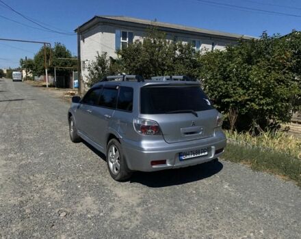 Серый Мицубиси Аутлендер, объемом двигателя 2.4 л и пробегом 291 тыс. км за 5999 $, фото 2 на Automoto.ua