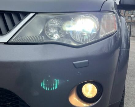 Серый Мицубиси Аутлендер, объемом двигателя 2 л и пробегом 275 тыс. км за 8500 $, фото 20 на Automoto.ua