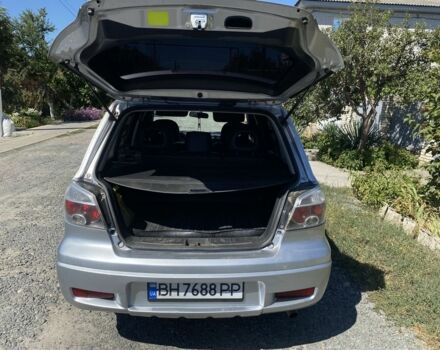 Серый Мицубиси Аутлендер, объемом двигателя 2.4 л и пробегом 291 тыс. км за 5999 $, фото 4 на Automoto.ua