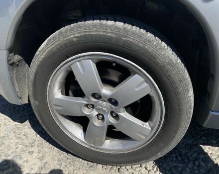 Серый Мицубиси Аутлендер, объемом двигателя 2.4 л и пробегом 291 тыс. км за 5999 $, фото 7 на Automoto.ua