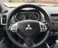 Серый Мицубиси Аутлендер, объемом двигателя 2 л и пробегом 275 тыс. км за 8500 $, фото 9 на Automoto.ua
