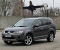 Серый Мицубиси Аутлендер, объемом двигателя 2 л и пробегом 275 тыс. км за 8500 $, фото 1 на Automoto.ua