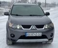 Серый Мицубиси Аутлендер, объемом двигателя 3 л и пробегом 263 тыс. км за 11500 $, фото 1 на Automoto.ua