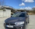 Серый Мицубиси Аутлендер, объемом двигателя 2.2 л и пробегом 280 тыс. км за 11500 $, фото 1 на Automoto.ua