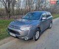 Сірий Міцубісі Аутлендер, об'ємом двигуна 2.4 л та пробігом 160 тис. км за 11900 $, фото 1 на Automoto.ua