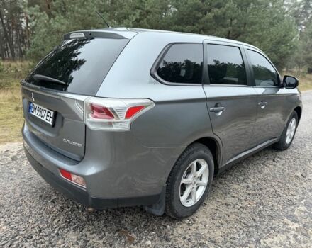 Серый Мицубиси Аутлендер, объемом двигателя 2.4 л и пробегом 150 тыс. км за 10900 $, фото 2 на Automoto.ua
