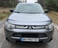 Серый Мицубиси Аутлендер, объемом двигателя 2.4 л и пробегом 150 тыс. км за 10900 $, фото 6 на Automoto.ua