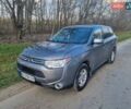 Серый Мицубиси Аутлендер, объемом двигателя 2.4 л и пробегом 120 тыс. км за 12900 $, фото 1 на Automoto.ua