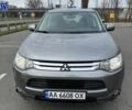 Серый Мицубиси Аутлендер, объемом двигателя 2 л и пробегом 177 тыс. км за 10399 $, фото 1 на Automoto.ua