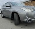 Серый Мицубиси Аутлендер, объемом двигателя 2 л и пробегом 177 тыс. км за 10399 $, фото 4 на Automoto.ua