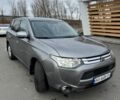 Серый Мицубиси Аутлендер, объемом двигателя 2 л и пробегом 177 тыс. км за 10399 $, фото 2 на Automoto.ua