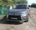 Сірий Міцубісі Аутлендер, об'ємом двигуна 2.3 л та пробігом 195 тис. км за 11000 $, фото 1 на Automoto.ua