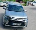 Сірий Міцубісі Аутлендер, об'ємом двигуна 2.4 л та пробігом 95 тис. км за 16800 $, фото 5 на Automoto.ua