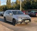 Серый Мицубиси Аутлендер, объемом двигателя 2 л и пробегом 132 тыс. км за 19885 $, фото 1 на Automoto.ua
