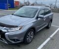 Серый Мицубиси Аутлендер, объемом двигателя 2.4 л и пробегом 160 тыс. км за 17500 $, фото 1 на Automoto.ua