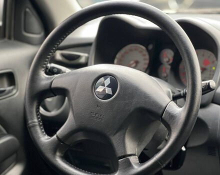 Сірий Міцубісі Аутлендер, об'ємом двигуна 2.4 л та пробігом 240 тис. км за 6700 $, фото 11 на Automoto.ua