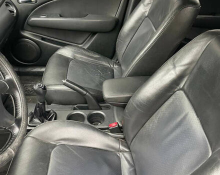 Сірий Міцубісі Аутлендер, об'ємом двигуна 2 л та пробігом 252 тис. км за 4600 $, фото 19 на Automoto.ua