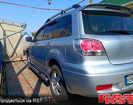 Серый Мицубиси Аутлендер, объемом двигателя 2 л и пробегом 280 тыс. км за 5500 $, фото 5 на Automoto.ua