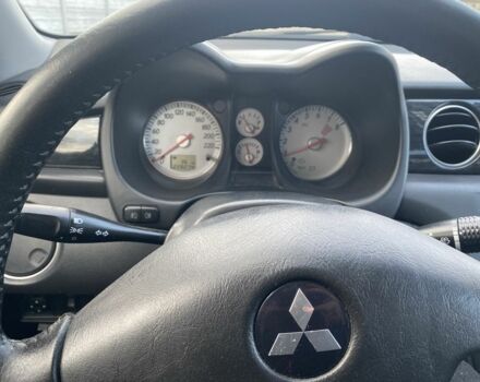 Сірий Міцубісі Аутлендер, об'ємом двигуна 2 л та пробігом 228 тис. км за 6300 $, фото 7 на Automoto.ua