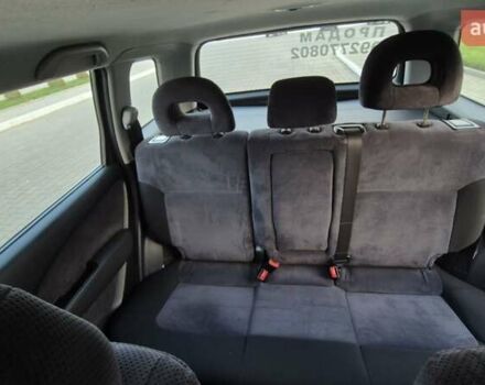 Серый Мицубиси Аутлендер, объемом двигателя 2 л и пробегом 209 тыс. км за 5800 $, фото 6 на Automoto.ua