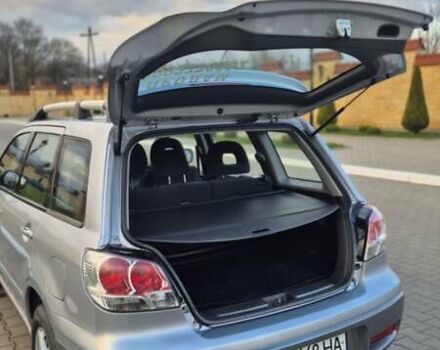 Серый Мицубиси Аутлендер, объемом двигателя 2 л и пробегом 209 тыс. км за 5800 $, фото 3 на Automoto.ua