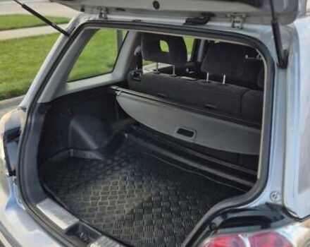 Серый Мицубиси Аутлендер, объемом двигателя 2 л и пробегом 209 тыс. км за 5800 $, фото 5 на Automoto.ua