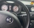 Сірий Міцубісі Аутлендер, об'ємом двигуна 2.4 л та пробігом 275 тис. км за 6400 $, фото 7 на Automoto.ua