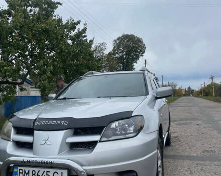 Сірий Міцубісі Аутлендер, об'ємом двигуна 2 л та пробігом 252 тис. км за 4600 $, фото 17 на Automoto.ua
