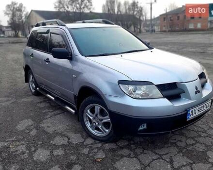 Серый Мицубиси Аутлендер, объемом двигателя 2 л и пробегом 400 тыс. км за 5000 $, фото 11 на Automoto.ua