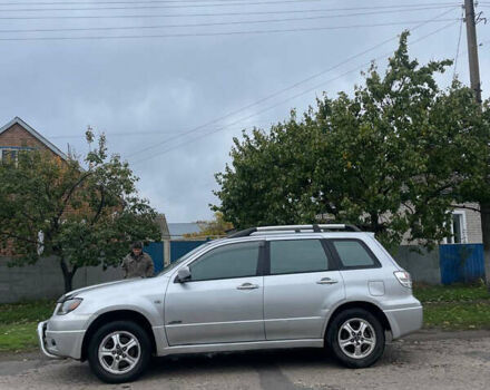 Сірий Міцубісі Аутлендер, об'ємом двигуна 2 л та пробігом 252 тис. км за 4600 $, фото 8 на Automoto.ua