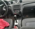 Серый Мицубиси Аутлендер, объемом двигателя 2.4 л и пробегом 250 тыс. км за 5600 $, фото 3 на Automoto.ua