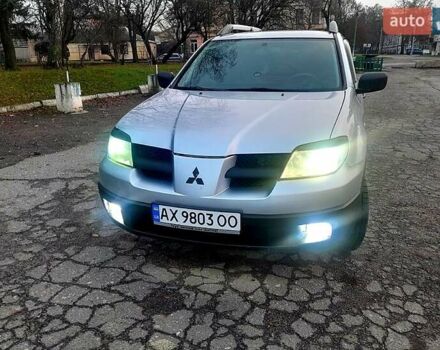 Серый Мицубиси Аутлендер, объемом двигателя 2 л и пробегом 400 тыс. км за 5000 $, фото 9 на Automoto.ua