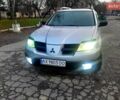 Серый Мицубиси Аутлендер, объемом двигателя 2 л и пробегом 400 тыс. км за 5000 $, фото 9 на Automoto.ua
