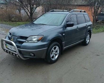 Сірий Міцубісі Аутлендер, об'ємом двигуна 2 л та пробігом 160 тис. км за 4800 $, фото 7 на Automoto.ua