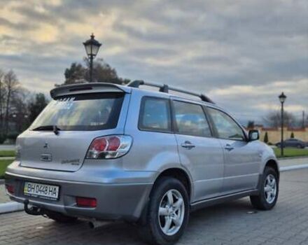 Серый Мицубиси Аутлендер, объемом двигателя 2 л и пробегом 209 тыс. км за 5800 $, фото 2 на Automoto.ua