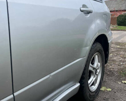 Сірий Міцубісі Аутлендер, об'ємом двигуна 2 л та пробігом 252 тис. км за 4600 $, фото 29 на Automoto.ua